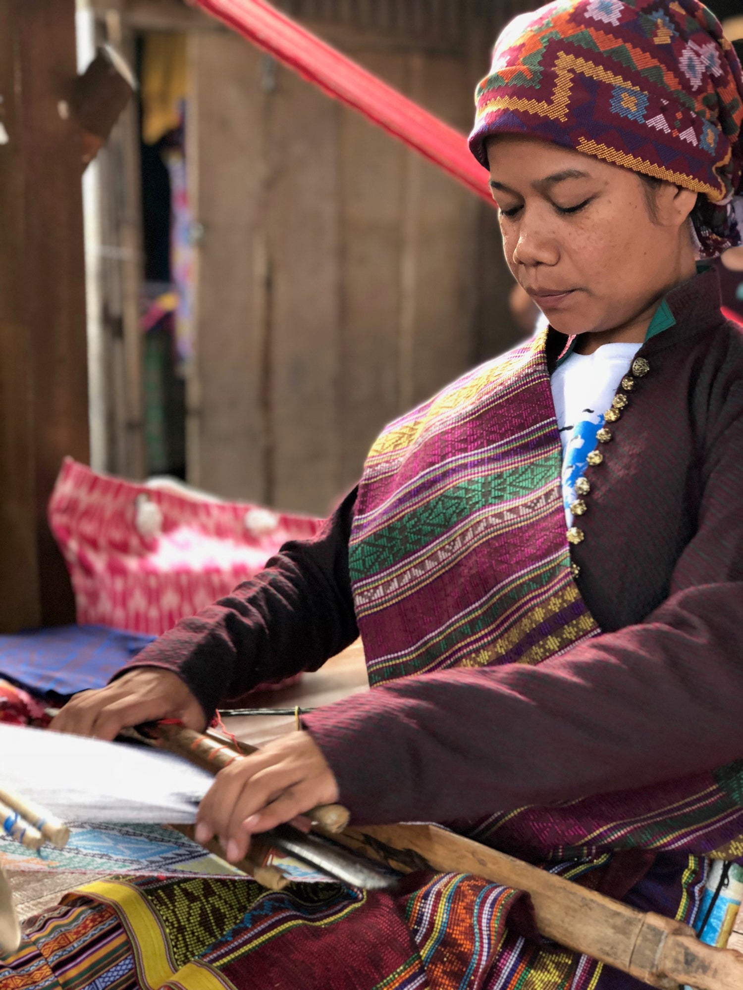 Yakan weaver weaving on a backstrap loom from Mindanao Philippines_Malingkat Weaves