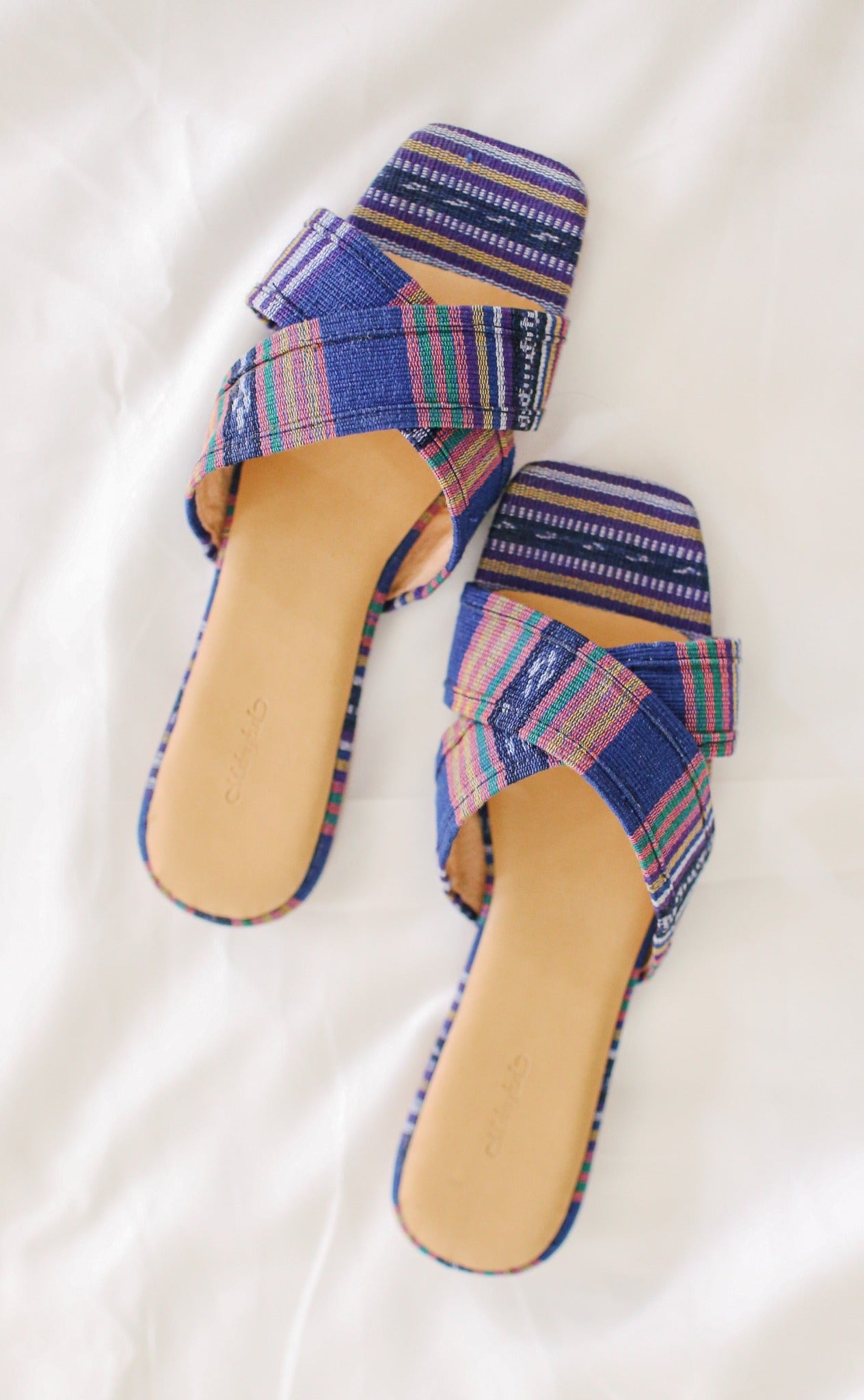 Marikina handcrafted leather slides  made of handwoven textile from the Mindanao, Philippines
